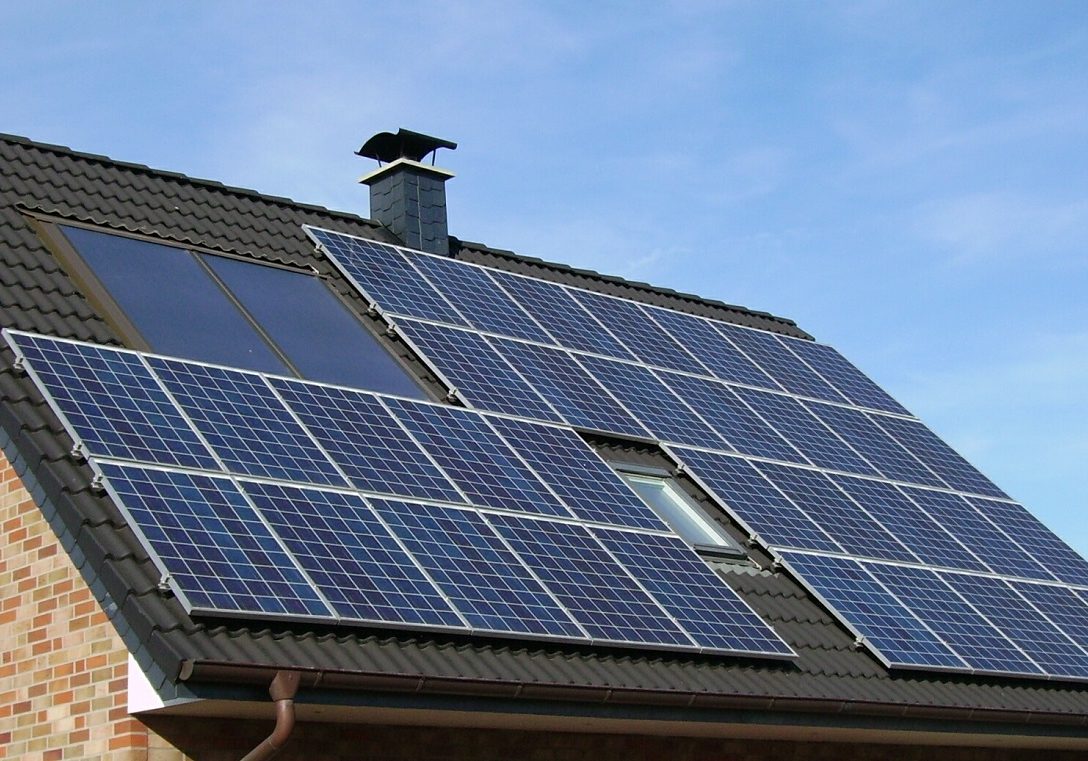 Solar panels on a roof. Original public domain image from Wikimedia Commons CCO license.